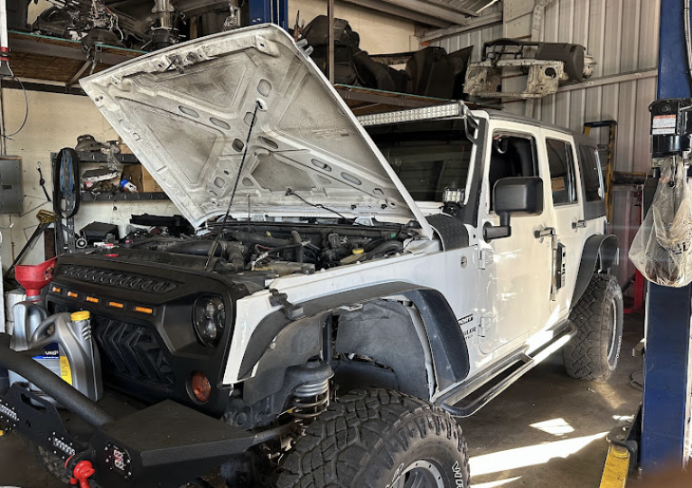 Jeep being repaired at Gama Auto Repair
