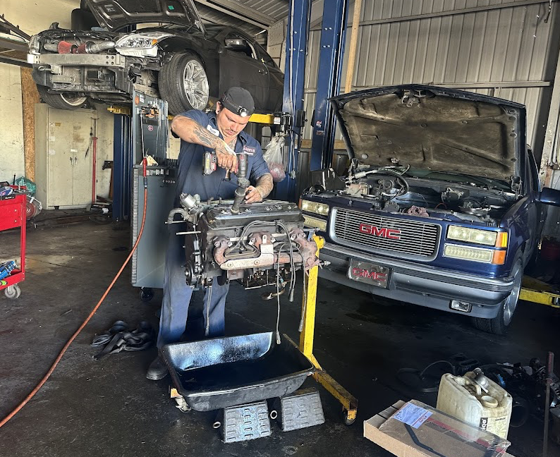 Mechanic working at Gama Auto Repair
